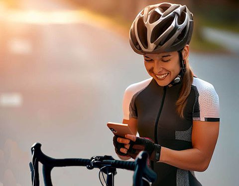 Cyclist in tech background
